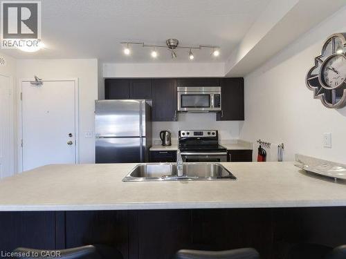 129 Isaac Devins Boulevard Unit# 7, Toronto, ON - Indoor Photo Showing Kitchen With Double Sink With Upgraded Kitchen
