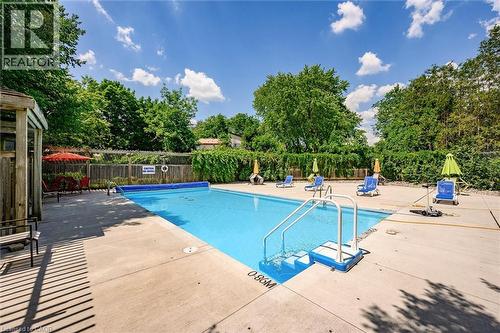 93 Westwood Road Unit# 607, Guelph, ON - Outdoor With In Ground Pool With Backyard