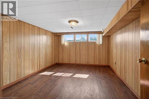 Unfurnished room featuring dark wood-style flooring - 122 Glen Forest Drive, Hamilton, ON - Indoor Photo Showing Other Room