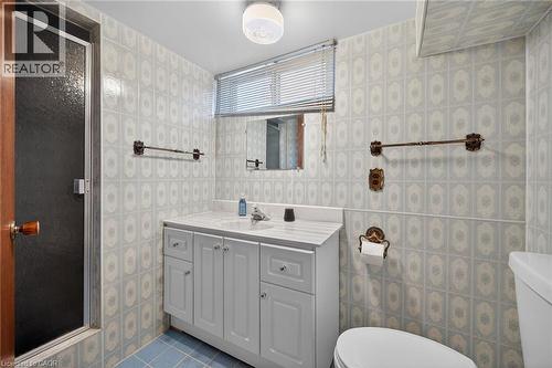 Full bathroom with a shower stall, vanity, and tile patterned floors - 122 Glen Forest Drive, Hamilton, ON - Indoor Photo Showing Bathroom