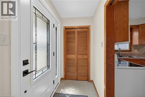Entryway featuring tile patterned floors and baseboards - 122 Glen Forest Drive, Hamilton, ON - Indoor