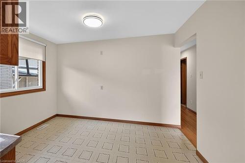 Unfurnished room with baseboards - 122 Glen Forest Drive, Hamilton, ON - Indoor Photo Showing Other Room