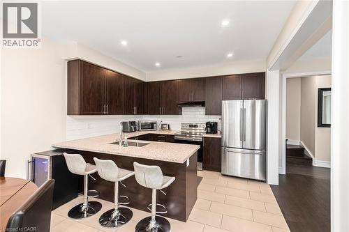 70 Fleming Crescent, Caledonia, ON - Indoor Photo Showing Kitchen With Double Sink