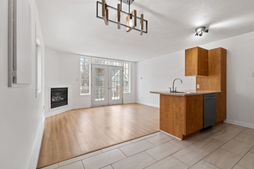 Overall view - B-325 Rue Champlain, Gatineau (Hull), QC - Indoor With Fireplace