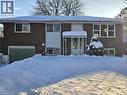 Bi-level home featuring an attached garage and brick siding - 593 Mount Anne Drive, Waterloo, ON  - Outdoor 