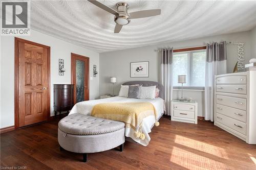 Bedroom with hardwood / wood-style floors and ceiling fan - 15 Marquette Drive, Kitchener, ON - Indoor Photo Showing Bedroom