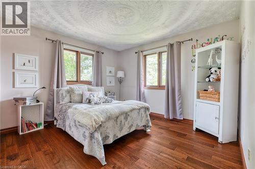 Bedroom featuring dark wood-style floors - 15 Marquette Drive, Kitchener, ON - Indoor Photo Showing Bedroom