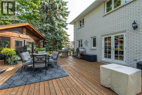 Deck with french doors, area for grilling, and outdoor dining area - 15 Marquette Drive, Kitchener, ON - Outdoor With Deck Patio Veranda With Exterior