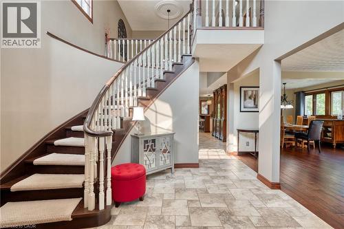 Stairway featuring a high ceiling and stone finish flooring - 15 Marquette Drive, Kitchener, ON - Indoor Photo Showing Other Room