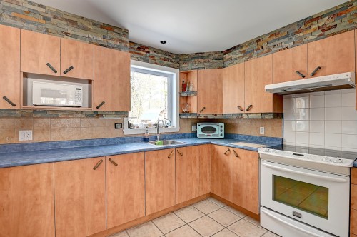 Cuisine - 398  - 400 Rue Évelyne, Lavaltrie, QC - Indoor Photo Showing Kitchen