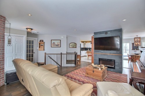 Vue d'ensemble - 750 Av. Dion, Val-D'Or, QC - Indoor Photo Showing Living Room With Fireplace