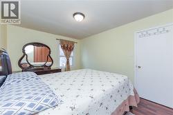 Bedroom with wood finished floors - 