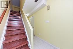 Stairs featuring baseboards - 