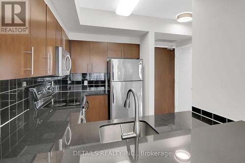 Granite countertops. - 1202 - 200 Rideau Street, Ottawa, ON - Indoor Photo Showing Kitchen