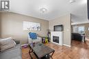 411 3826 Dewdney Avenue E, Regina, SK  - Indoor Photo Showing Living Room With Fireplace 