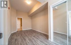 Empty room with light wood-style flooring and baseboards - 