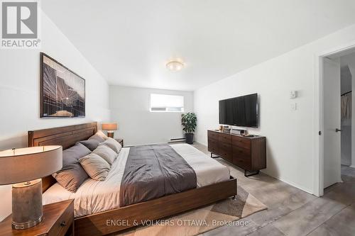 This photo has been virtually staged. - 311 Presland Road, Ottawa, ON - Indoor Photo Showing Bedroom