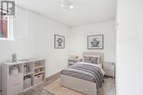 This photo has been virtually staged. - 311 Presland Road, Ottawa, ON - Indoor Photo Showing Bedroom