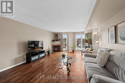 902 Longfields Drive, Ottawa, ON - Indoor Photo Showing Living Room With Fireplace