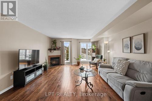 902 Longfields Drive, Ottawa, ON - Indoor Photo Showing Living Room With Fireplace