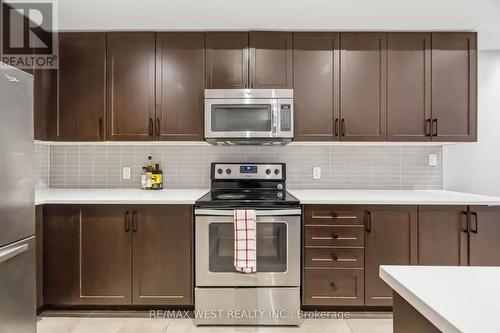 32 - 3905 Major Mackenzie Drive, Vaughan, ON - Indoor Photo Showing Kitchen With Stainless Steel Kitchen With Upgraded Kitchen