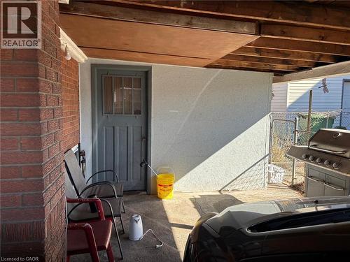View of patio with a grill - 1224 Dunsmure Road, Hamilton, ON -  With Exterior