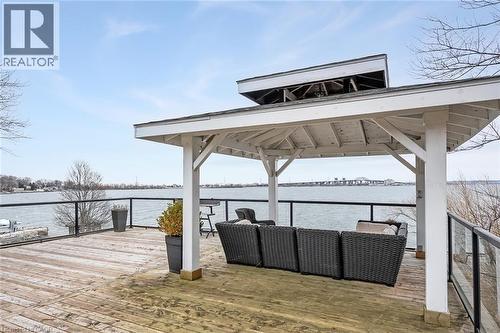 Deck featuring a gazebo, a water view, and outdoor seating - 624 North Shore Boulevard E, Burlington, ON - Outdoor With Body Of Water With Exterior