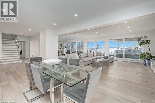 Dining space featuring light wood finished floors and recessed lighting - 624 North Shore Boulevard E, Burlington, ON - Indoor