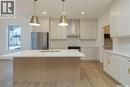 150 Mazurek Crescent, Saskatoon, SK  - Indoor Photo Showing Kitchen With Upgraded Kitchen 