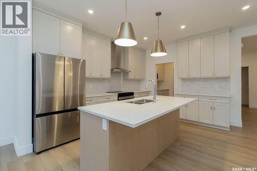 150 Mazurek Crescent, Saskatoon, SK - Indoor Photo Showing Kitchen With Double Sink With Upgraded Kitchen