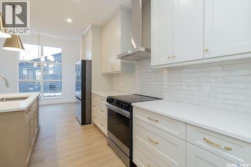 150 Mazurek Crescent, Saskatoon, SK - Indoor Photo Showing Kitchen With Upgraded Kitchen