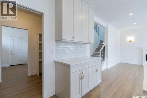 150 Mazurek Crescent, Saskatoon, SK - Indoor Photo Showing Other Room With Fireplace