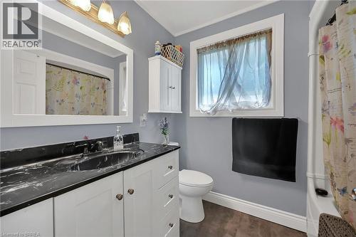 Bathroom with vanity and dark wood finished floors - 56 Forsythe Avenue, Brantford, ON - Indoor Photo Showing Bathroom