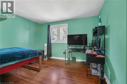 Bedroom with wood finished floors and baseboards - 56 Forsythe Avenue, Brantford, ON - Indoor Photo Showing Bedroom