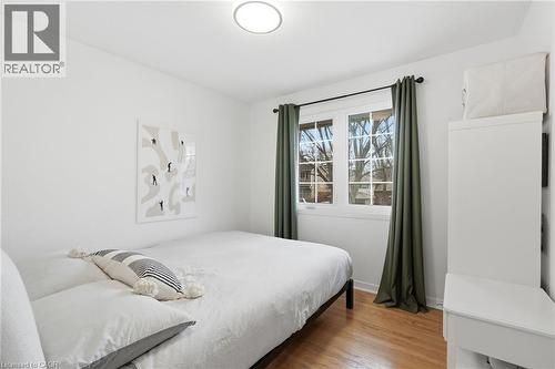 Bedroom with light wood-style flooring and baseboards - 227 Walden Drive, Burlington, ON - Indoor Photo Showing Bedroom
