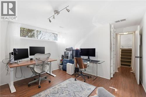 Office space with dark wood finished floors and track lighting - 227 Walden Drive, Burlington, ON - Indoor Photo Showing Office
