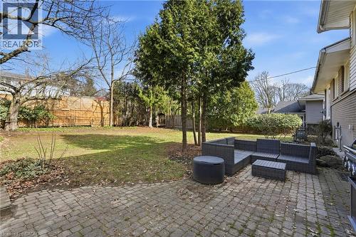 Fenced backyard featuring a patio area and an outdoor hangout area - 227 Walden Drive, Burlington, ON - Outdoor