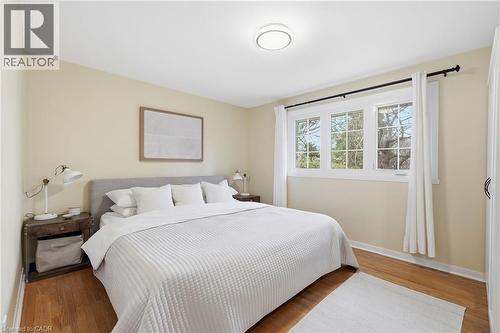 Bedroom featuring light wood-type flooring and baseboards - 227 Walden Drive, Burlington, ON - Indoor Photo Showing Bedroom