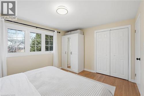 Bedroom featuring light wood finished floors and a closet - 227 Walden Drive, Burlington, ON - Indoor Photo Showing Bedroom
