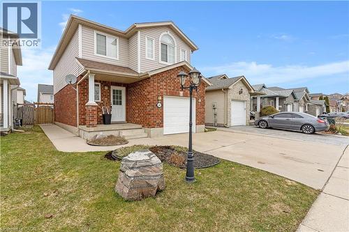 View of front of home featuring concrete driveway. - 440 Langlaw Drive, Cambridge, ON - Outdoor With Facade