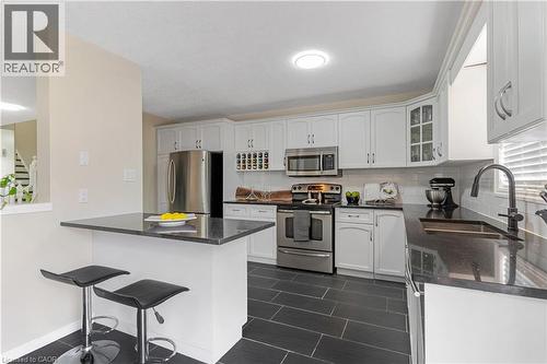 Kitchen featuring a breakfast bar area,. - 440 Langlaw Drive, Cambridge, ON - Indoor Photo Showing Kitchen