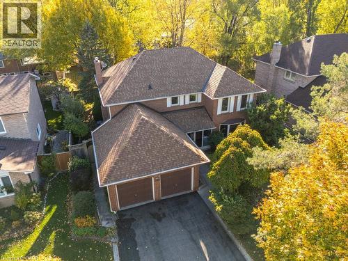 View of subject property featuring a tree filled landscape - 700 Fieldstone Road, Mississauga, ON - Outdoor