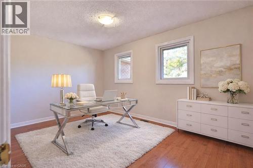 Office with light wood-style flooring and a textured ceiling - 700 Fieldstone Road, Mississauga, ON - Indoor Photo Showing Office