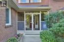 Entrance to property with brick siding and french doors - 700 Fieldstone Road, Mississauga, ON  - Outdoor With Exterior 