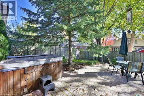 Fenced backyard featuring a patio and outdoor dining area - 700 Fieldstone Road, Mississauga, ON - Outdoor