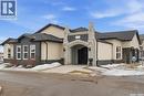 211 130 Phelps Way, Saskatoon, SK  - Outdoor With Facade 