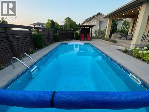 1768 Split Rail Place, Kelowna, BC - Outdoor With In Ground Pool