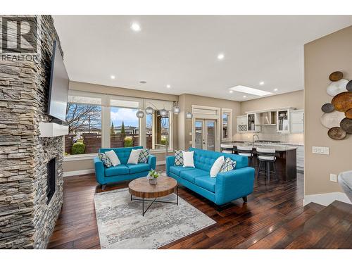 1768 Split Rail Place, Kelowna, BC - Indoor Photo Showing Living Room With Fireplace