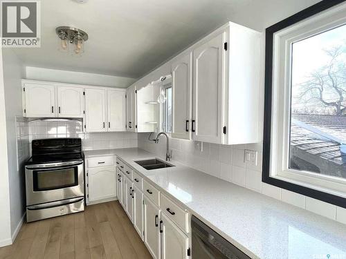 7227 6Th Avenue, Regina, SK - Indoor Photo Showing Kitchen With Double Sink