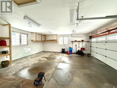 Garage - Large windows - 111 Balm Beach Road E, Tiny, ON - Indoor Photo Showing Garage